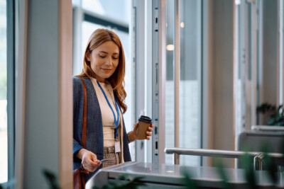 Employee using ID card to access office