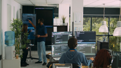 team of security professionals using advanced tech