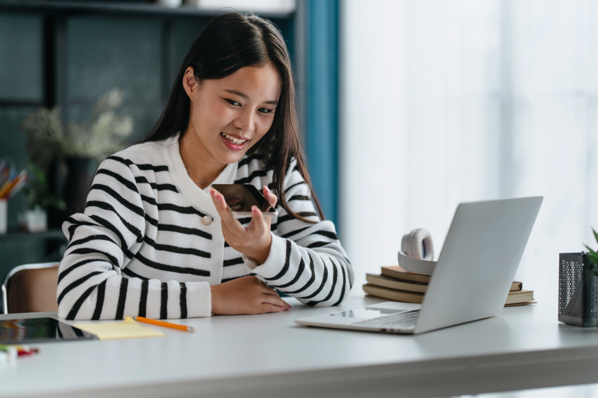 Woman using AI on smartphone