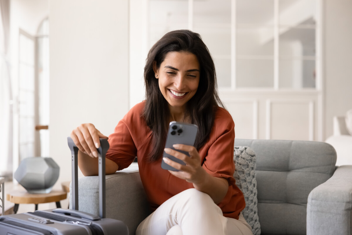 woman typing on smartphone
