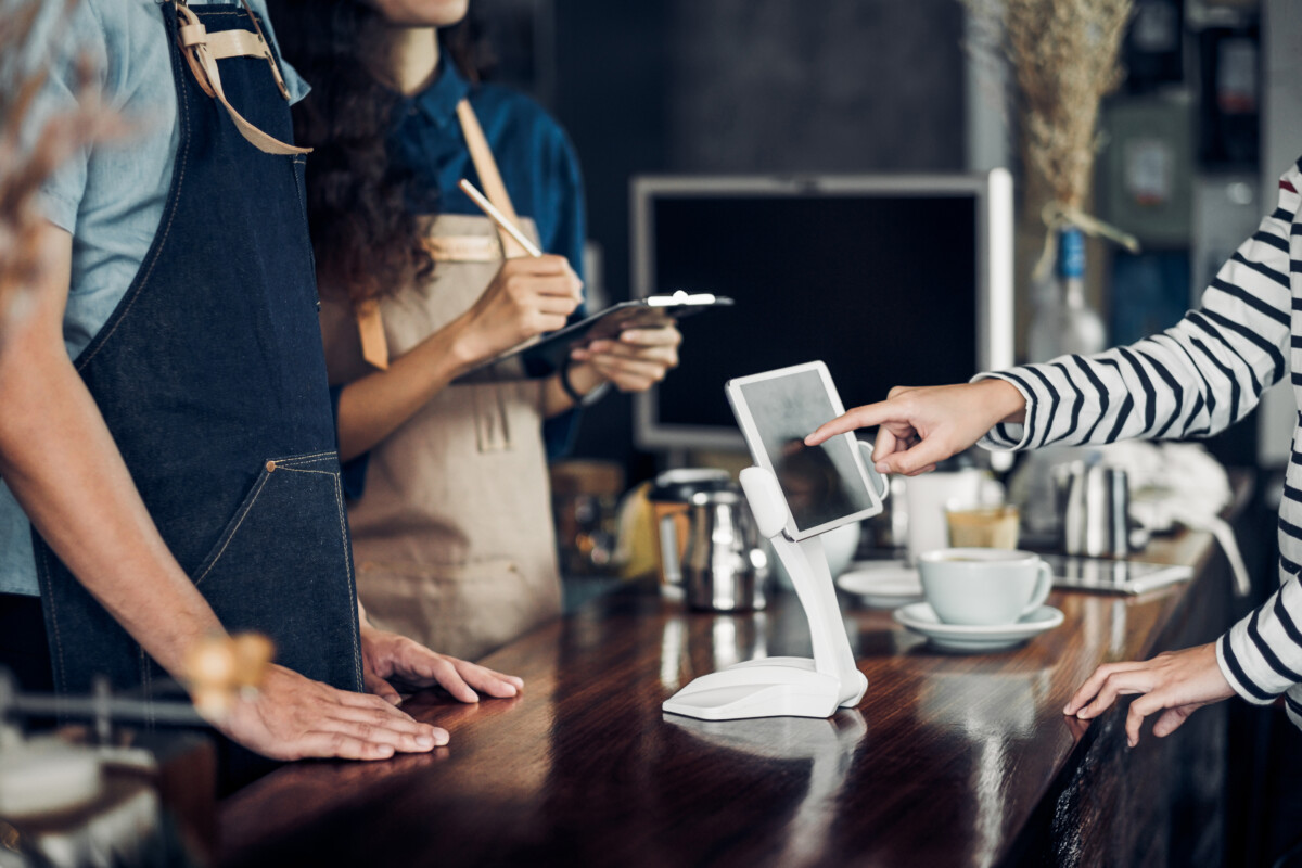 customer self service with tablet screen at cafe