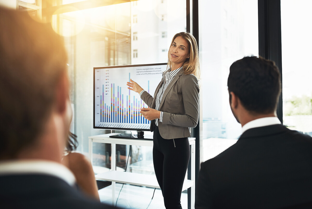 Business woman and presentation with graphs on screen for user personas customer insights
