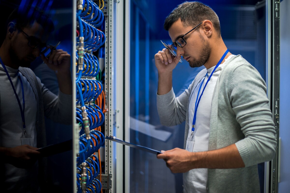 Man checking data center