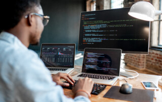 Programmer working with program code