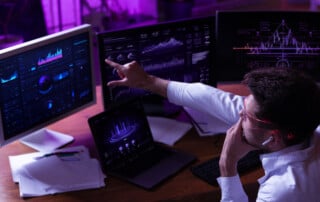 Business professional analyzing dashboards