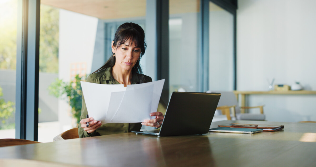 Business woman and document with laptop