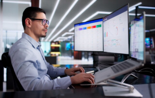 CRM system in use by office worker