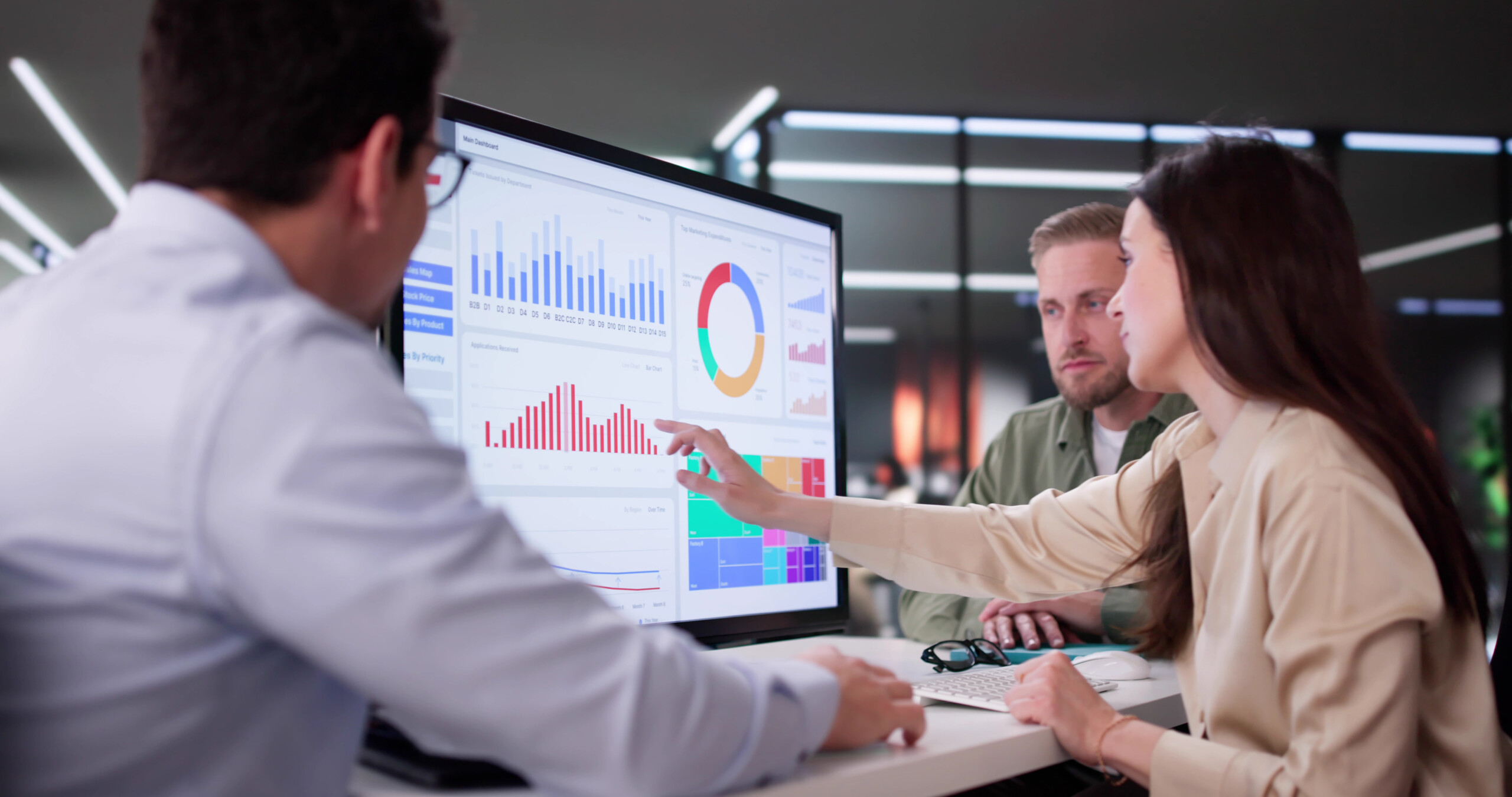 Businesswoman Managing Company Data Using Analytics Dashboard