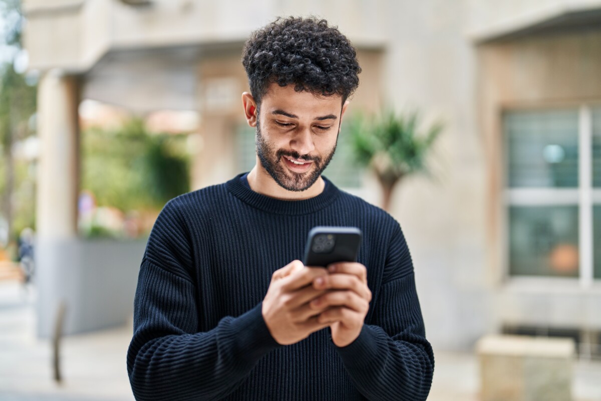 male using cell phone