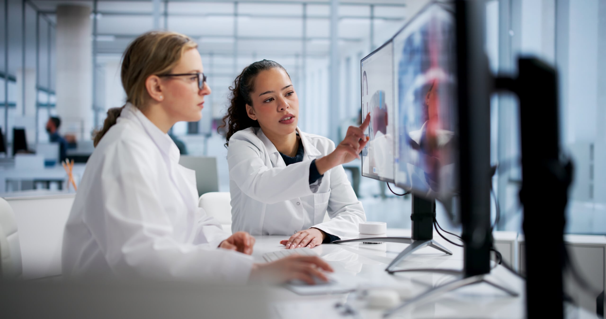 Innovative Female Dentists Utilizing 3D Computer Technology For Dental Screenings.