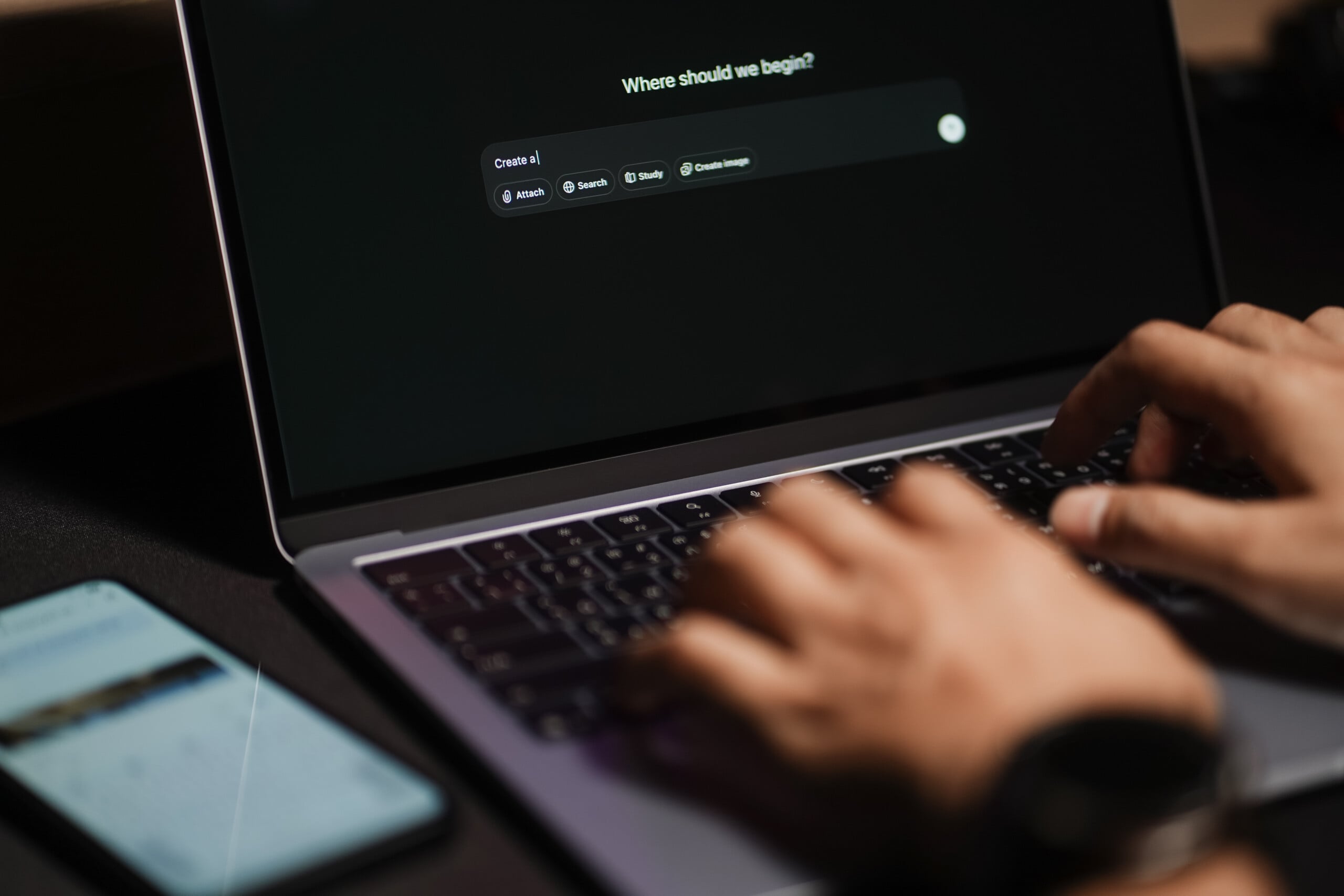Person using AI assistant typing a prompt